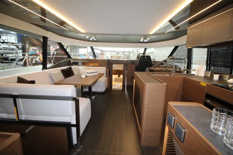  Yacht Photos Pics Luxurious interior of 2025 Prestige M48 yacht with modern furnishings and sleek design.
