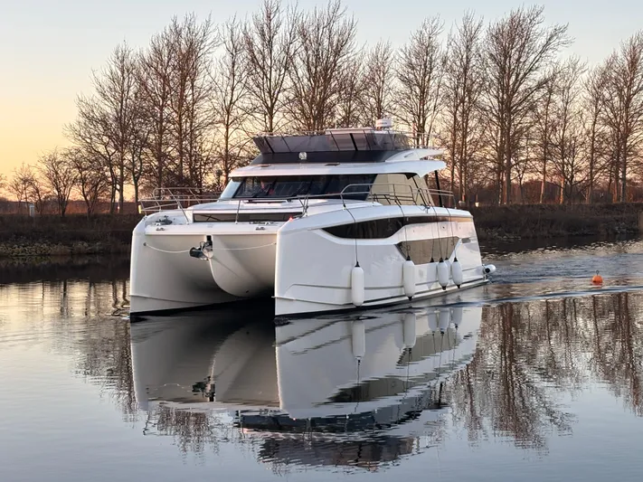  Yacht Photos Pics Luxury Prestige M48 yacht cruising on a calm river, 2025 model.