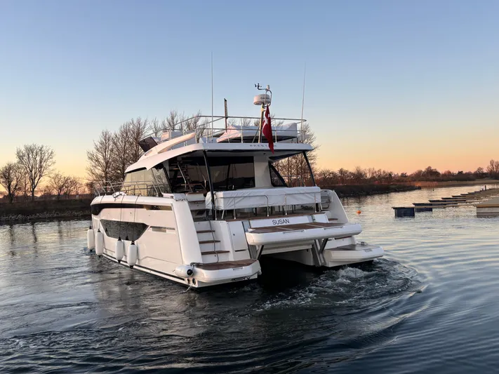  Yacht Photos Pics Luxury Prestige M48 yacht cruising at sunset, 2025 model.