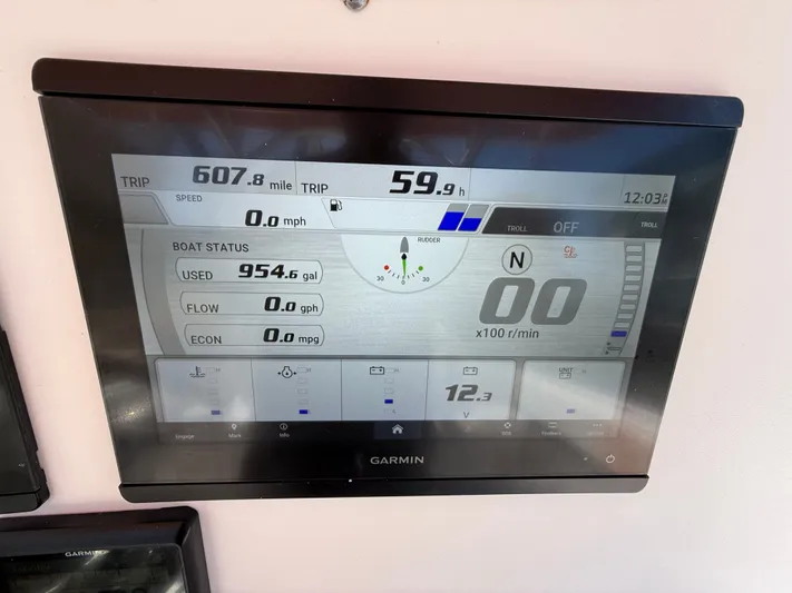  Yacht Photos Pics Garmin display on Intrepid 356 boat, showing trip and fuel data.