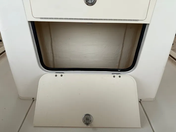  Yacht Photos Pics Intrepid 356 boat compartment door open, year 2000.