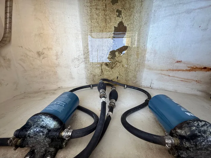  Yacht Photos Pics Intrepid 356 boat engine compartment with hoses and filters, year 2000.