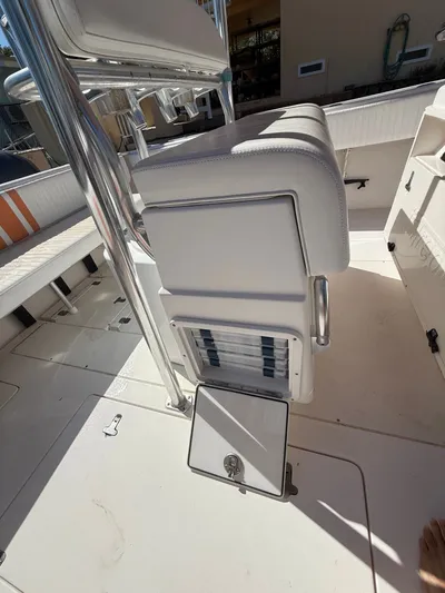  Yacht Photos Pics Intrepid 356 boat, seating area with storage, year 2000.