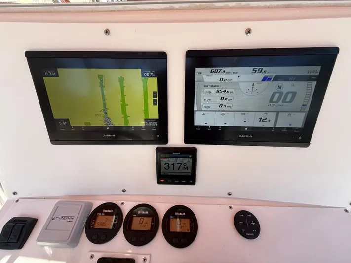  Yacht Photos Pics Boat dashboard with Garmin displays, Intrepid 356, year 2000.