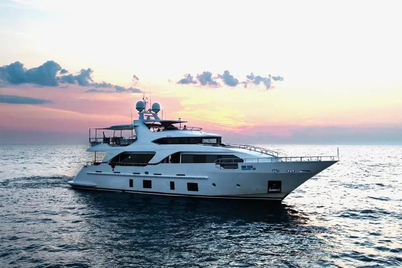  Yacht Photos Pics Luxury yacht Benetti Delfino 93 cruising at sunset, 2013 model.