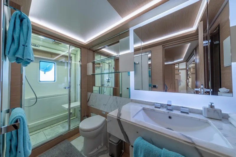  Yacht Photos Pics Luxurious bathroom on 2013 Benetti Delfino 93 yacht with modern fixtures and elegant design.