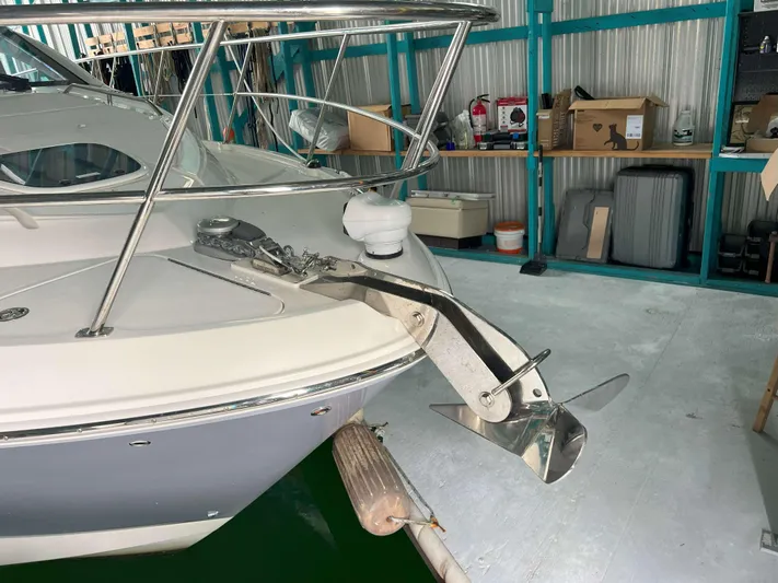 The Good Life Yacht Photos Pics 2018 Sea Ray 400 Sundancer yacht bow with anchor in storage.
