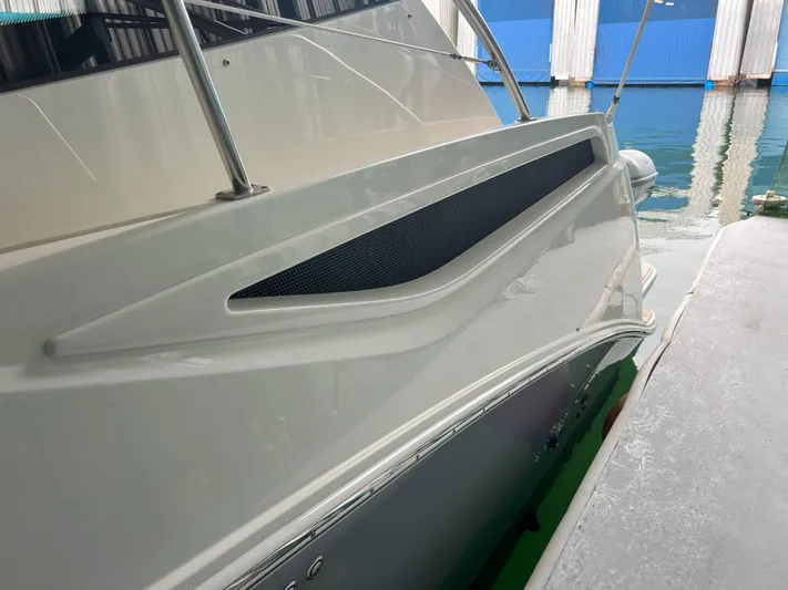 The Good Life Yacht Photos Pics 2018 Sea Ray 400 Sundancer yacht docked, showcasing sleek design and modern detailing.