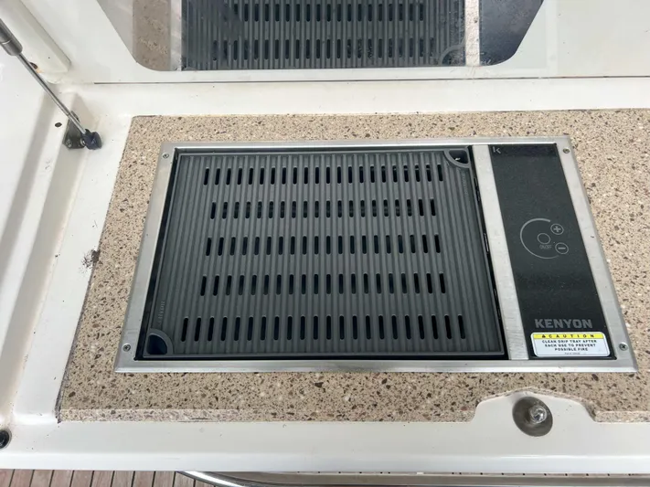 The Good Life Yacht Photos Pics Kenyon grill on 2018 Sea Ray 400 Sundancer yacht countertop.