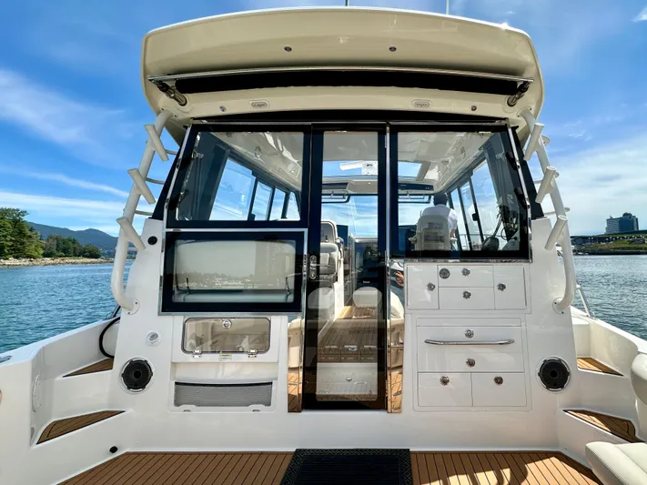 Blue Reeler Yacht Photos Pics 2023 Boston Whaler 405 Conquest boat interior with sleek design and modern amenities.