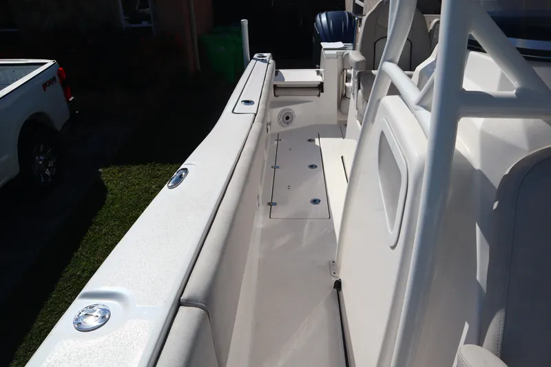  Yacht Photos Pics 2022 Sea Fox 288 Commander boat interior with seating and storage compartments.