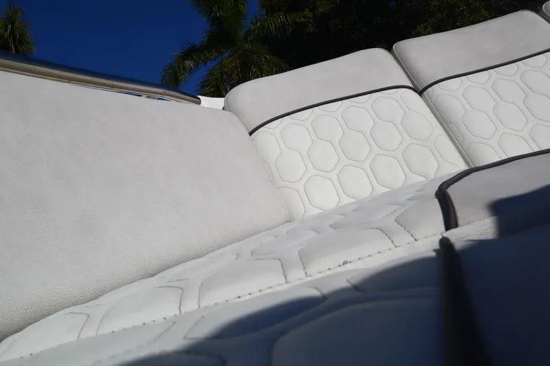  Yacht Photos Pics 2022 Sea Fox 288 Commander boat seating with hexagonal pattern under blue sky.