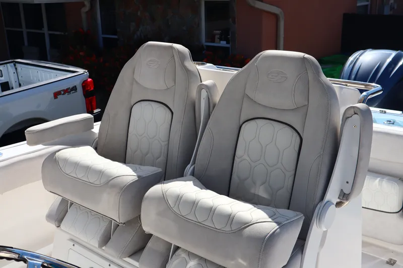  Yacht Photos Pics 2022 Sea Fox 288 Commander boat seats, featuring plush, ergonomic design and armrests.