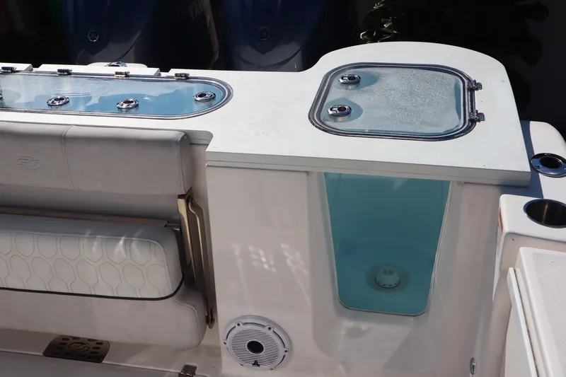  Yacht Photos Pics 2022 Sea Fox 288 Commander boat interior with seating and storage compartments.