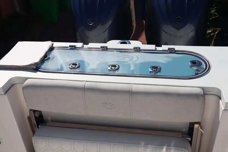  Yacht Photos Pics 2022 Sea Fox 288 Commander boat with sleek seating and storage area.