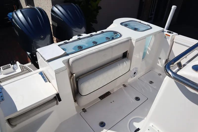  Yacht Photos Pics 2022 Sea Fox 288 Commander boat interior with dual engines and seating area.