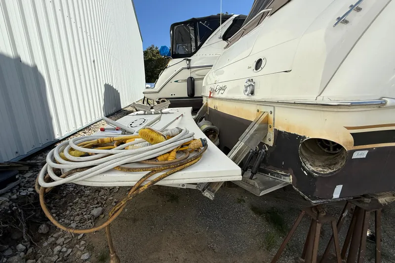  Yacht Photos Pics 1998 Sea Ray 480 Sedan Bridge yacht with maintenance equipment on deck.