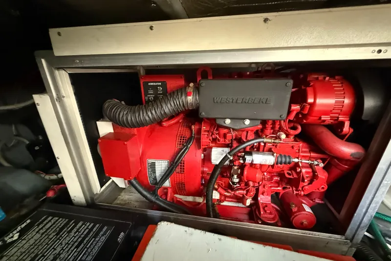  Yacht Photos Pics Engine compartment of a 1998 Sea Ray 480 Sedan Bridge with Westerbeke generator.
