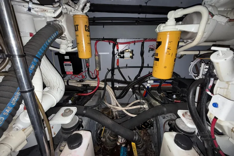  Yacht Photos Pics Engine room of a 1998 Sea Ray 480 Sedan Bridge with visible CAT filters and wiring.