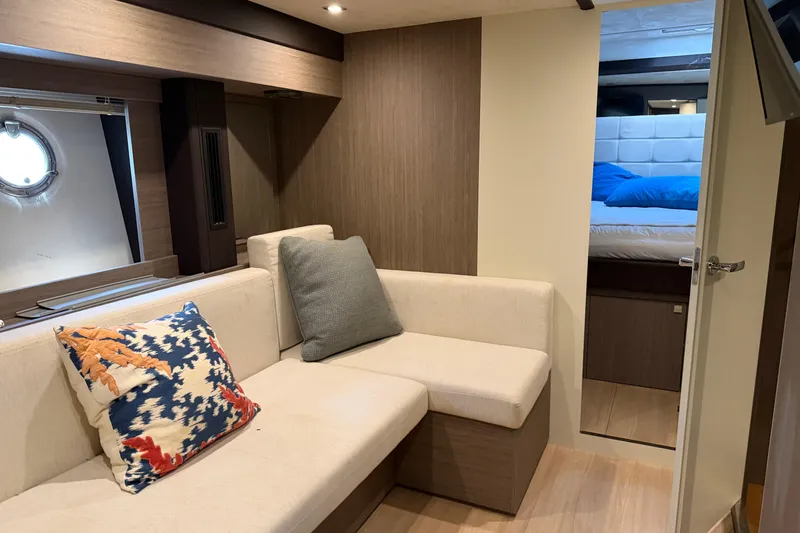  Yacht Photos Pics Interior of 2016 Cranchi Eco Trawler 53, featuring cozy seating and modern design.