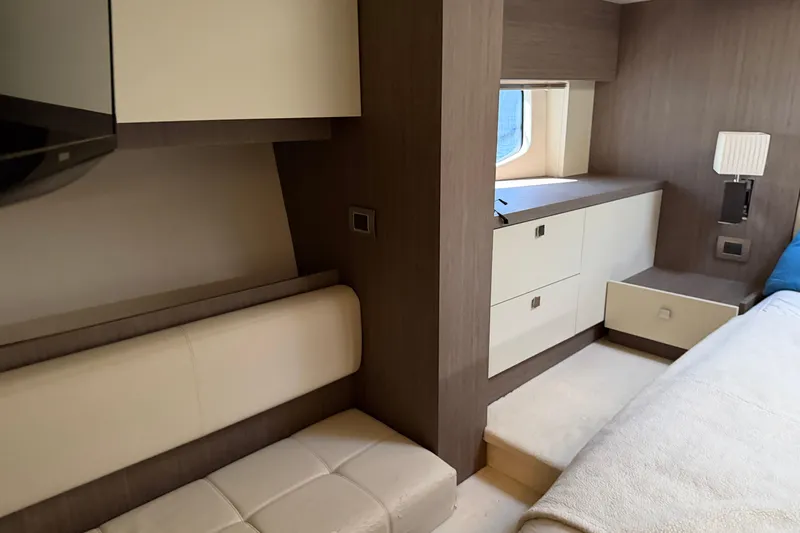  Yacht Photos Pics 2016 Cranchi Eco Trawler 53 Long Distance interior with modern design and cozy seating.