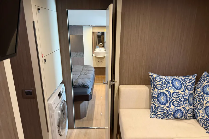  Yacht Photos Pics Interior of 2016 Cranchi Eco Trawler 53, featuring cozy seating and modern amenities.