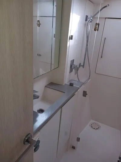 Red Robin Yacht Photos Pics Modern bathroom in 2019 Leopard 40 yacht with shower and sleek fixtures.