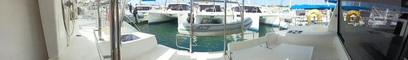 Red Robin Yacht Photos Pics Panoramic view from a 2019 Leopard 40 catamaran docked at a marina.