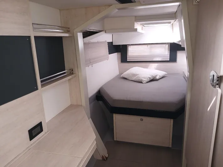 Red Robin Yacht Photos Pics 2019 Leopard 40 yacht interior with cozy bed and modern design.