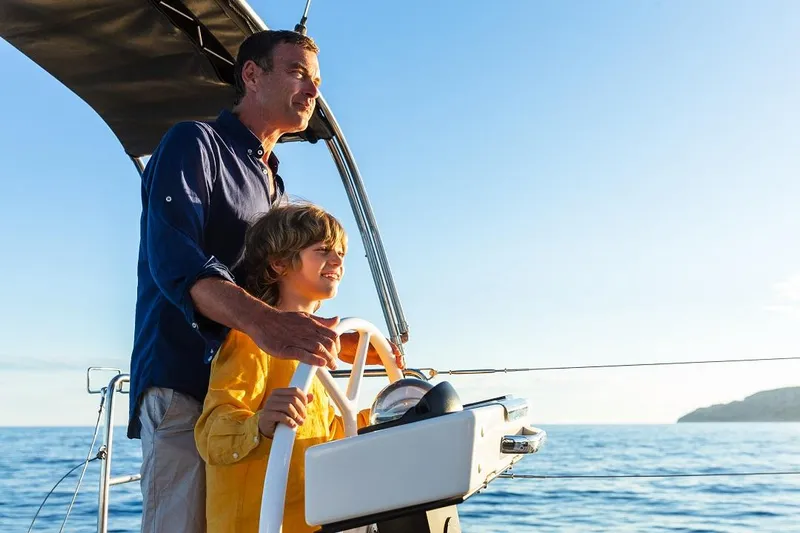 Dufour 530 In Annapolis Yacht Photos Pics Father and son sailing on a 2024 Dufour 530 yacht.