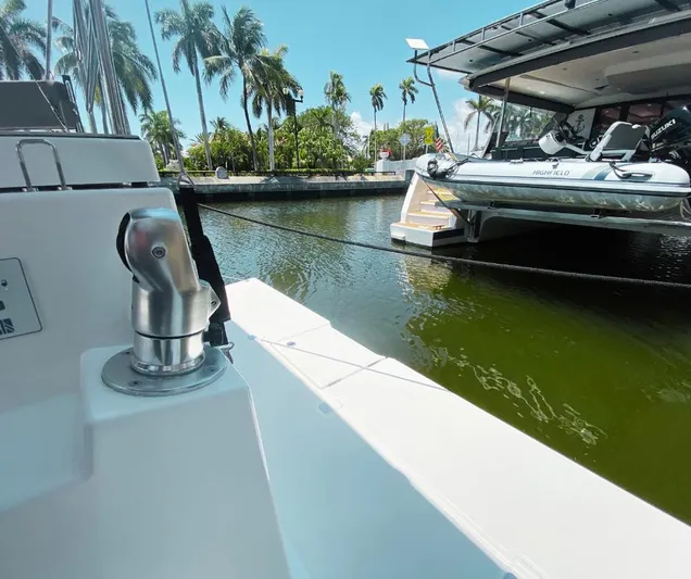 Dufour 530 In Annapolis Yacht Photos Pics Dufour 530 yacht docked in a marina, surrounded by palm trees, 2024 model.