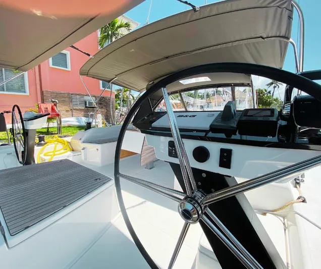 Dufour 530 In Annapolis Yacht Photos Pics 2024 Dufour 530 yacht cockpit with dual steering wheels and modern navigation equipment.