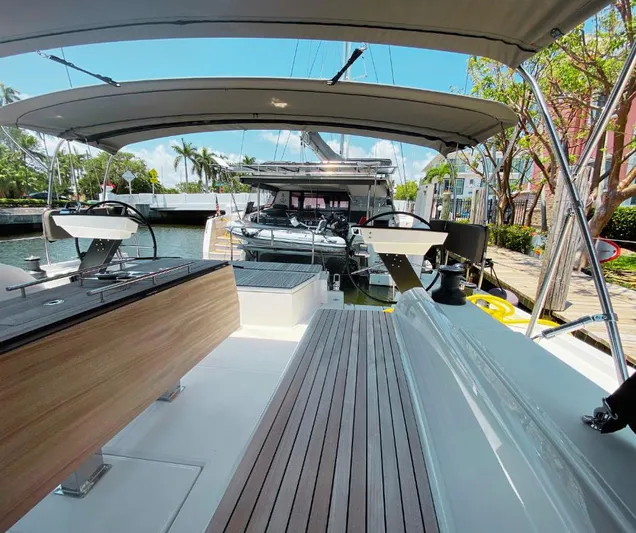 Dufour 530 In Annapolis Yacht Photos Pics 2024 Dufour 530 yacht docked, featuring spacious deck and dual helm stations.