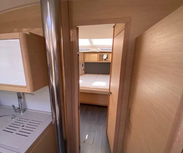 Dufour 530 In Annapolis Yacht Photos Pics Interior of 2024 Dufour 530 yacht, featuring modern kitchen and cozy bedroom.