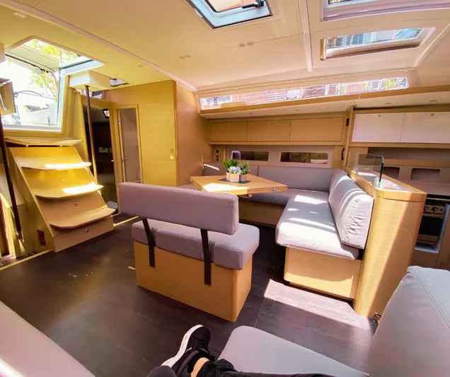 Dufour 530 In Annapolis Yacht Photos Pics Spacious interior of 2024 Dufour 530 yacht with modern furnishings and ample natural light.