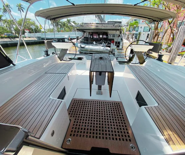 Dufour 530 In Annapolis Yacht Photos Pics 2024 Dufour 530 yacht cockpit with teak flooring and dual steering wheels.