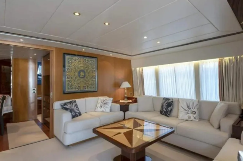  Yacht Photos Pics Luxurious interior of 1995 Codecasa 24 yacht with elegant seating and decor.
