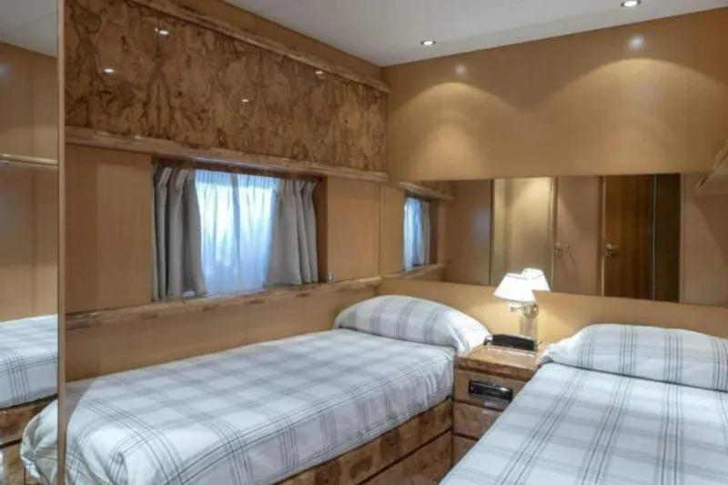  Yacht Photos Pics Luxurious Codecasa 24 yacht bedroom interior, featuring twin beds and elegant wood paneling, 1995 model.