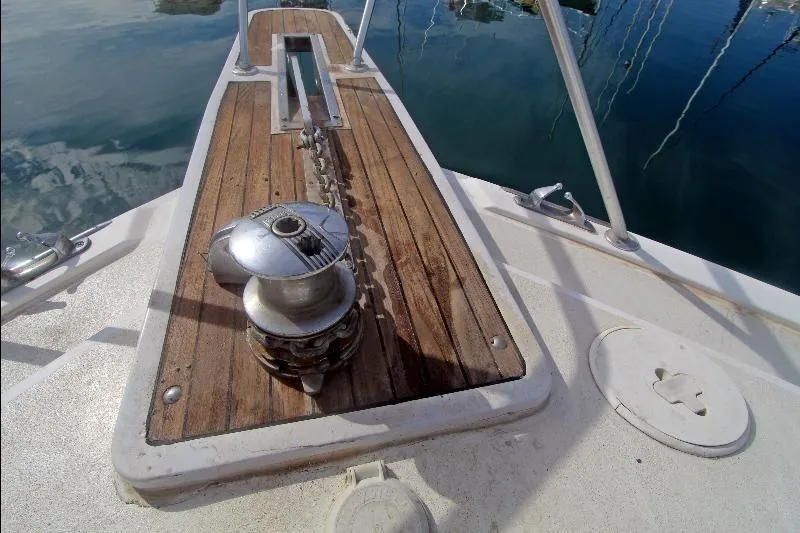  Yacht Photos Pics Bow of 1994 Bertram 50 Convertible with anchor winch and teak decking.