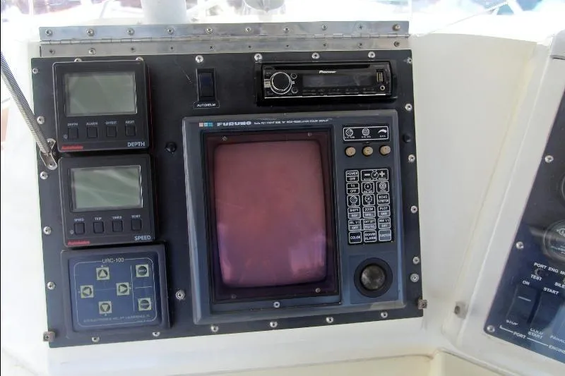  Yacht Photos Pics Control panel of a 1994 Bertram 50 Convertible boat with navigation and depth instruments.