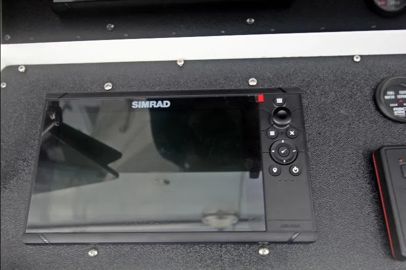  Yacht Photos Pics Simrad marine display on 1994 Bertram 50 Convertible dashboard.
