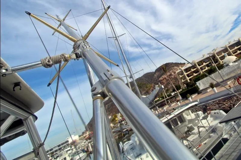  Yacht Photos Pics Close-up of a 1994 Bertram 50 Convertible yacht mast in a marina setting.
