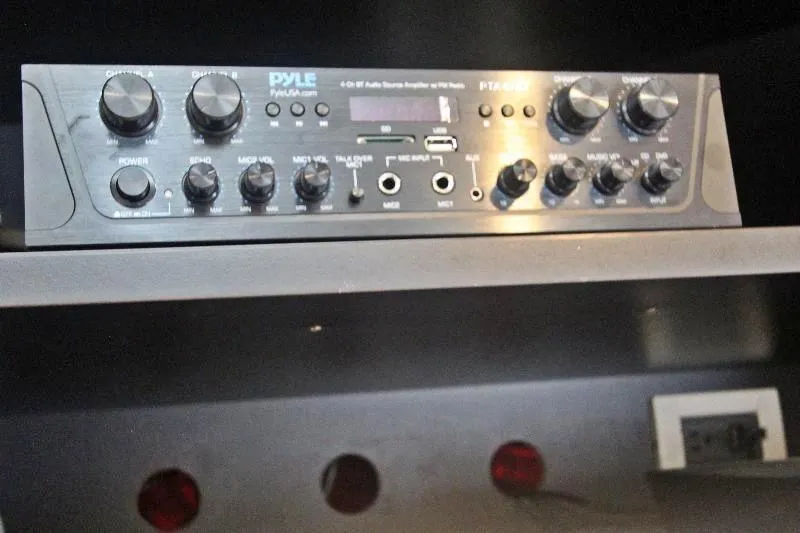  Yacht Photos Pics Audio amplifier on a 1994 Bertram 50 Convertible yacht dashboard.