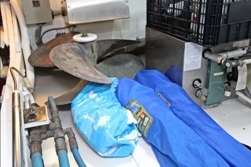  Yacht Photos Pics Engine room of 1994 Bertram 50 Convertible with propeller and equipment.