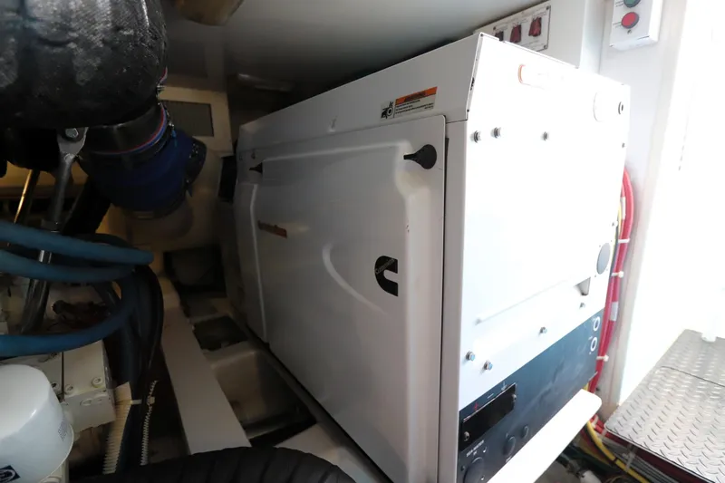 Juris Tantrum Yacht Photos Pics Engine room of 2011 Viking 46 Convertible yacht with Cummins generator.