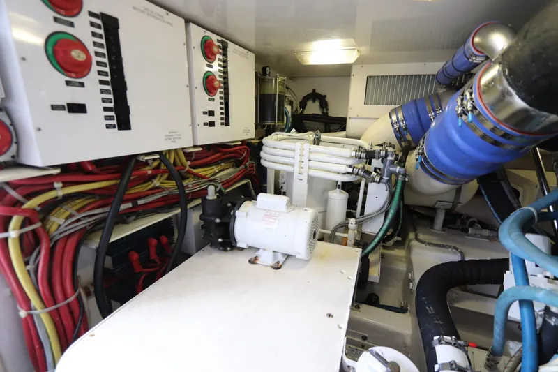 Juris Tantrum Yacht Photos Pics Engine room of 2011 Viking 46 Convertible yacht with wiring and machinery.