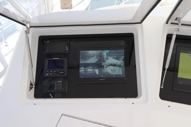 Juris Tantrum Yacht Photos Pics Control panel of 2011 Viking 46 Convertible yacht with Garmin and Furuno displays.