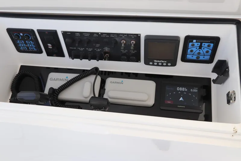 Juris Tantrum Yacht Photos Pics Control panel of a 2011 Viking 46 Convertible boat with Garmin navigation systems.