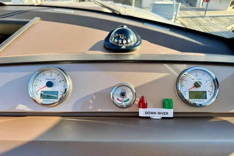 My Three Es Yacht Photos Pics Dashboard of a 2016 Prestige 500 S yacht with gauges and compass.
