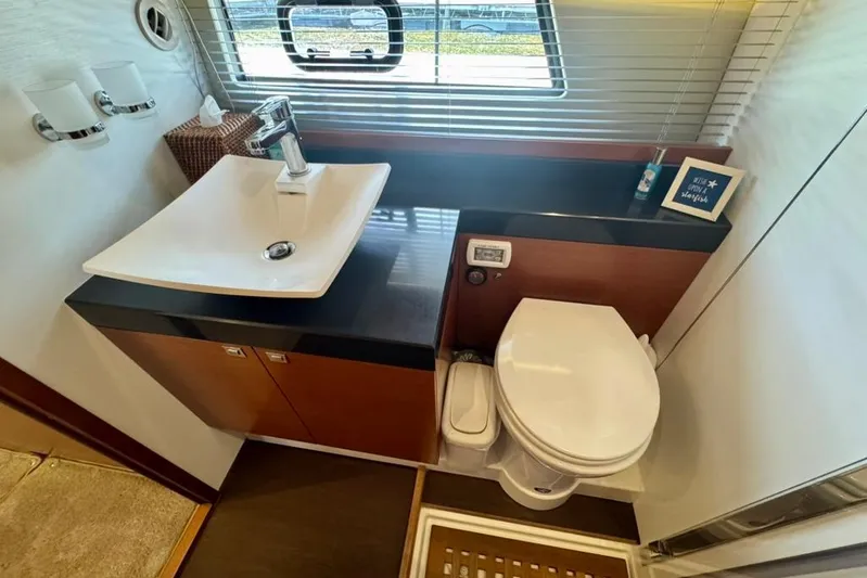 My Three Es Yacht Photos Pics Luxurious bathroom in 2016 Prestige 500 S yacht with modern sink and toilet.